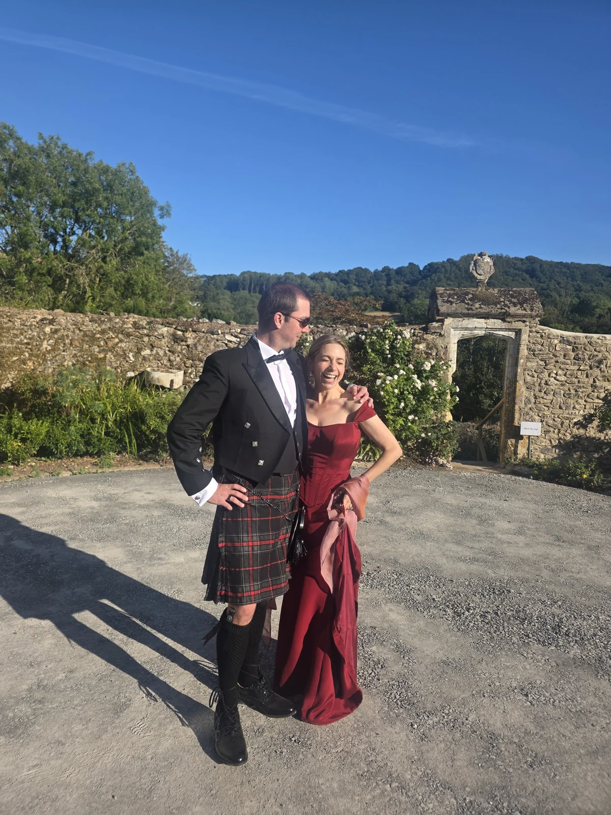 Leon and Raquel smiling together outdoors
